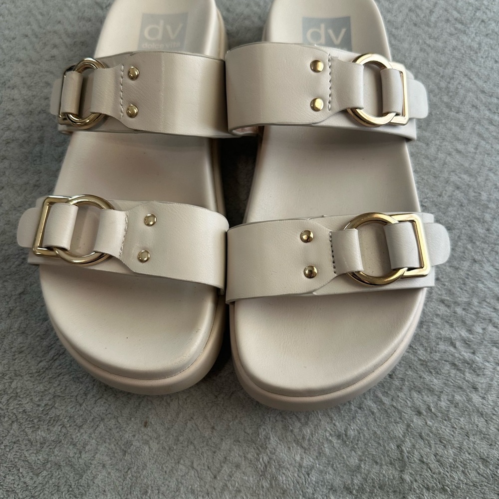 Dolce Vita Cream Sandals with Gold Buckles